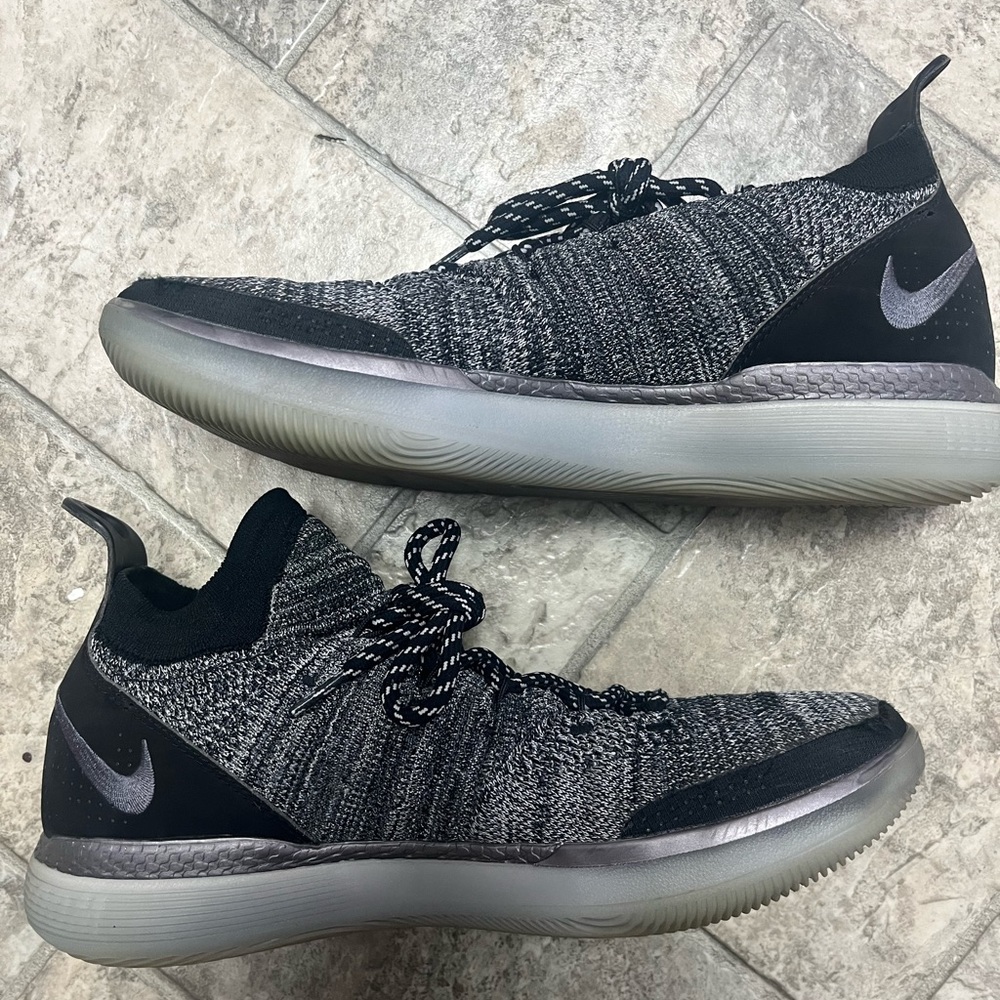 Mens KDXI (11’s) NIKE basketball shoes. Grey and black.